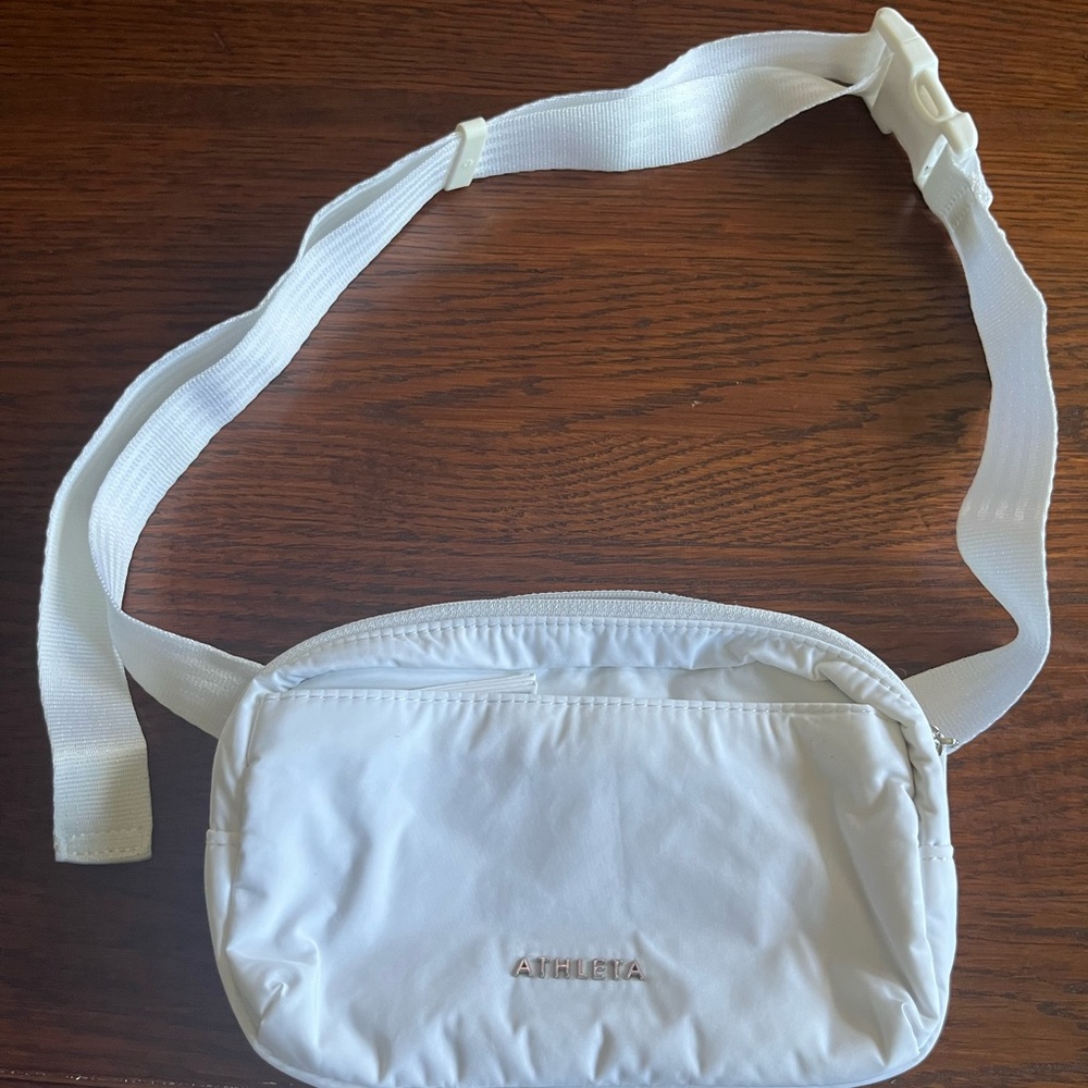 Small nylon fanny pack/cross body from Athleta. Brand new without tags.
